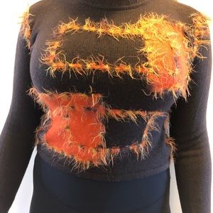 Incredible Italian designer’s Merino wool with acrylic Women’s sweater.